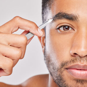 Shaping eyebrows with a blade